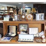 Two small mantel clocks; various items of plated cutlery & metalware; & sundry other items.