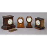 Two Edwardian mantel timepieces each in an inlaid-mahogany case; together with two Edwardian