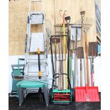 A Powerbase push-along lawnmower; together with two step ladders; & various garden tools.