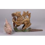 A Burmese painted & carved wooden dragon ornament, 14½” wide; & a ditto head ornament, 7½” high.