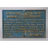 A vintage blue & white painted cast iron “London, North Eastern Railway Warning To Trespassers”