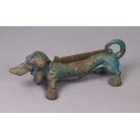 A pale blue painted cast-iron novelty boot-scraper in the form of a standing dachshund, 14¼” wide.