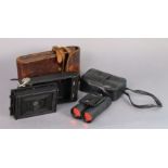 A Kodak “No. 1” folding pocket camera; & a pair of Tasco 10 x 25mm field glasses, each with case.