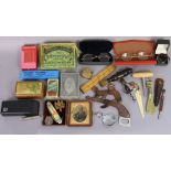 Two pairs of vintage spectacles; two corkscrews; a treen trinket box; two sets of playing cards,
