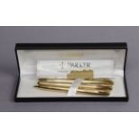 A Parker three-piece pen set, cased.