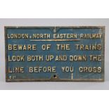 A vintage blue & white painted cast-iron “London, North Eastern Railway Beware of The Trains…..”