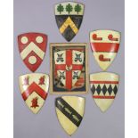 Seven painted wooden heraldry (quartering) plaques, 9½” x 7”.