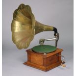 A replica Richmond “Rexophone” in oak case & with 21” diam. brass horn, with three records.