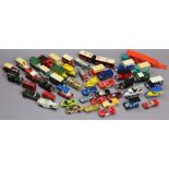 Approximately fifty various die-cast scale model vehicles by Lesney, Lledo, etc, all unboxed.