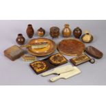 A marquetry-inlaid wooden adjustable book-trough; a pair of treen butter-pats; & various other treen