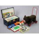 A vintage Deans/Gwentoy “bear” baby-walker; together with various toys & comics; & various