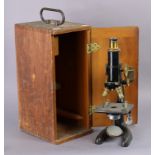 A vintage black lacquered & iron monocular microscope by Bausch & Lomb of Rochester N.Y., U.S.A.,