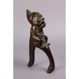 A pair of Victorian treen nutcrackers carved in the form of an imp, the front handle in the form