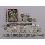 A collection of nineteen various ancient coins in excavated condition; two ditto finger rings; two
