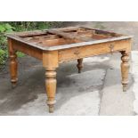 A 19th century oak dining table base (lacking top) fitted three frieze drawers & on four baluster-