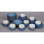A blue & white glazed pottery fourteen-piece part coffee service; & eight ditto cereal bowls.