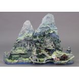 A painted ceramic rural-scene display model, 31” wide x 22” high.