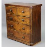 A Victorian mahogany small chest fitted two short and three long graduated drawers with turned