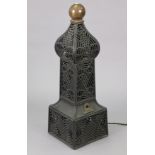 An Edwardian-style cast-iron heater, 35½” high.