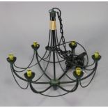 A dark green-finish wrought-metal six-branch ceiling light fitting, 22” wide x 20½” high.
