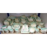 One hundred items of Susie Cooper “Dresden Sprays” dinner, tea, & coffee ware.