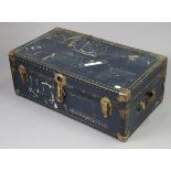 A blue fibre-covered travelling trunk having a hinged lift-lid 36” wide; together with an