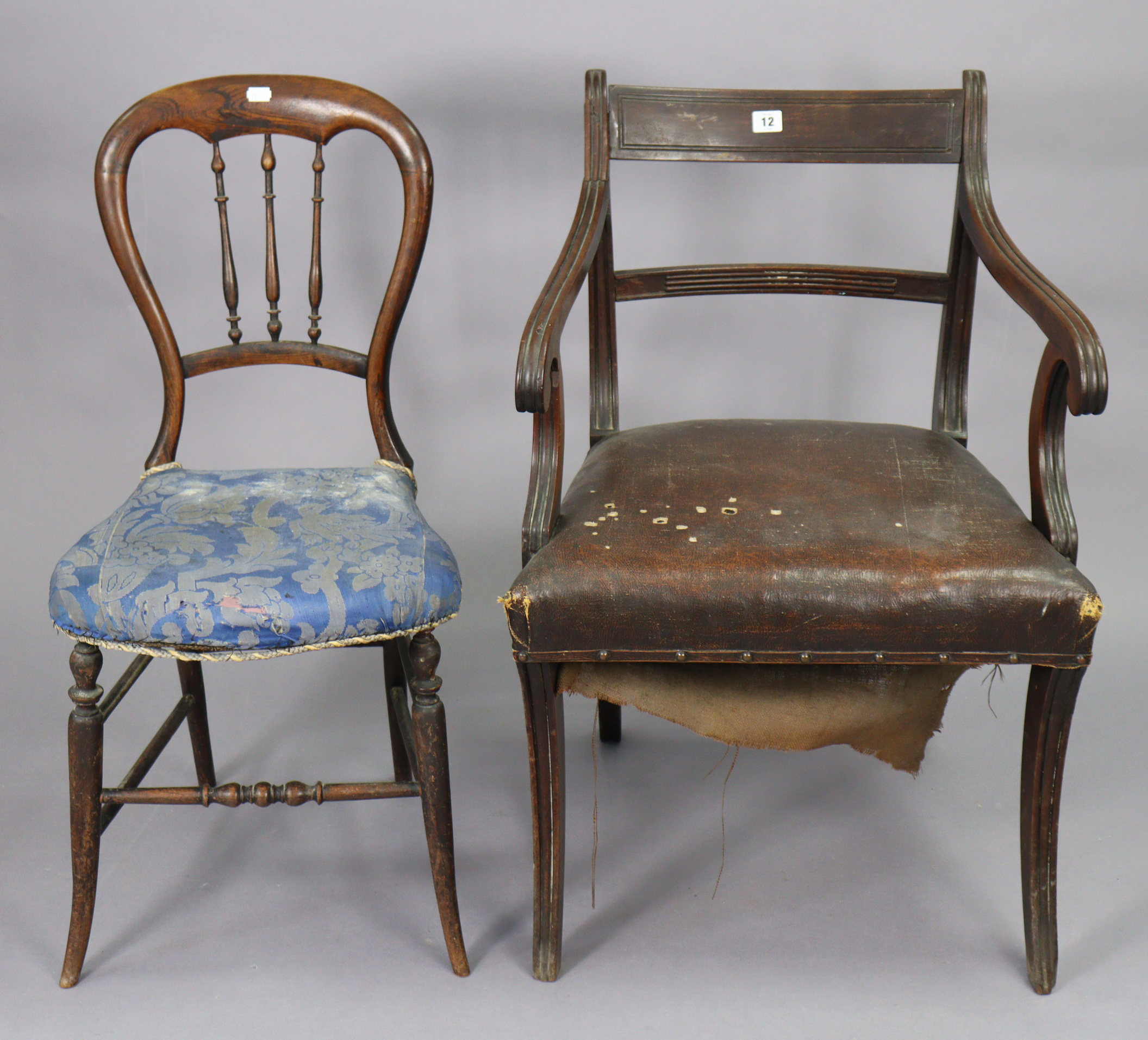 A 19th century mahogany bow-back carver chair with a padded seat, & on fluted sabre legs; together