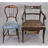 A 19th century mahogany bow-back carver chair with a padded seat, & on fluted sabre legs; together