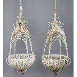 A pair of Victorian-style white painted wrought- metal hanging baskets (slight faults), 14½”