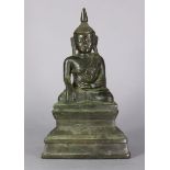 A 19th century Burmese shan-style bronze figure of Buddha Sakyamuni, seated in varasana, 10¼” high x