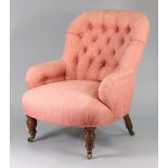 A Victorian nursing chair by John Reid & Sons, Park Row, Leeds, with buttoned back & arms
