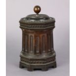 A 19th century fruitwood rotunda-form tea caddy, with carved decoration to the removable cover &