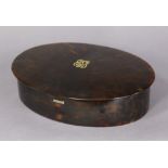 A tortoiseshell oval box, the domed hinged lid with silver-gilt hinge, lock-catch, & applied