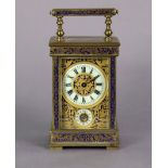 A 19th century French brass & champleve enamel carriage timepiece with gilt foliate decoration on