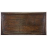 An antique oak rectangular panel with moulded edge, 31” x 60”.