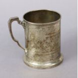 A Victorian silver christening mug of cylindrical form with stylised engraved floral decoration &