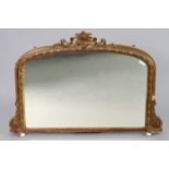 A Victorian overmantel mirror in a painted gilt gesso frame with central cartouche, acorn & leaf