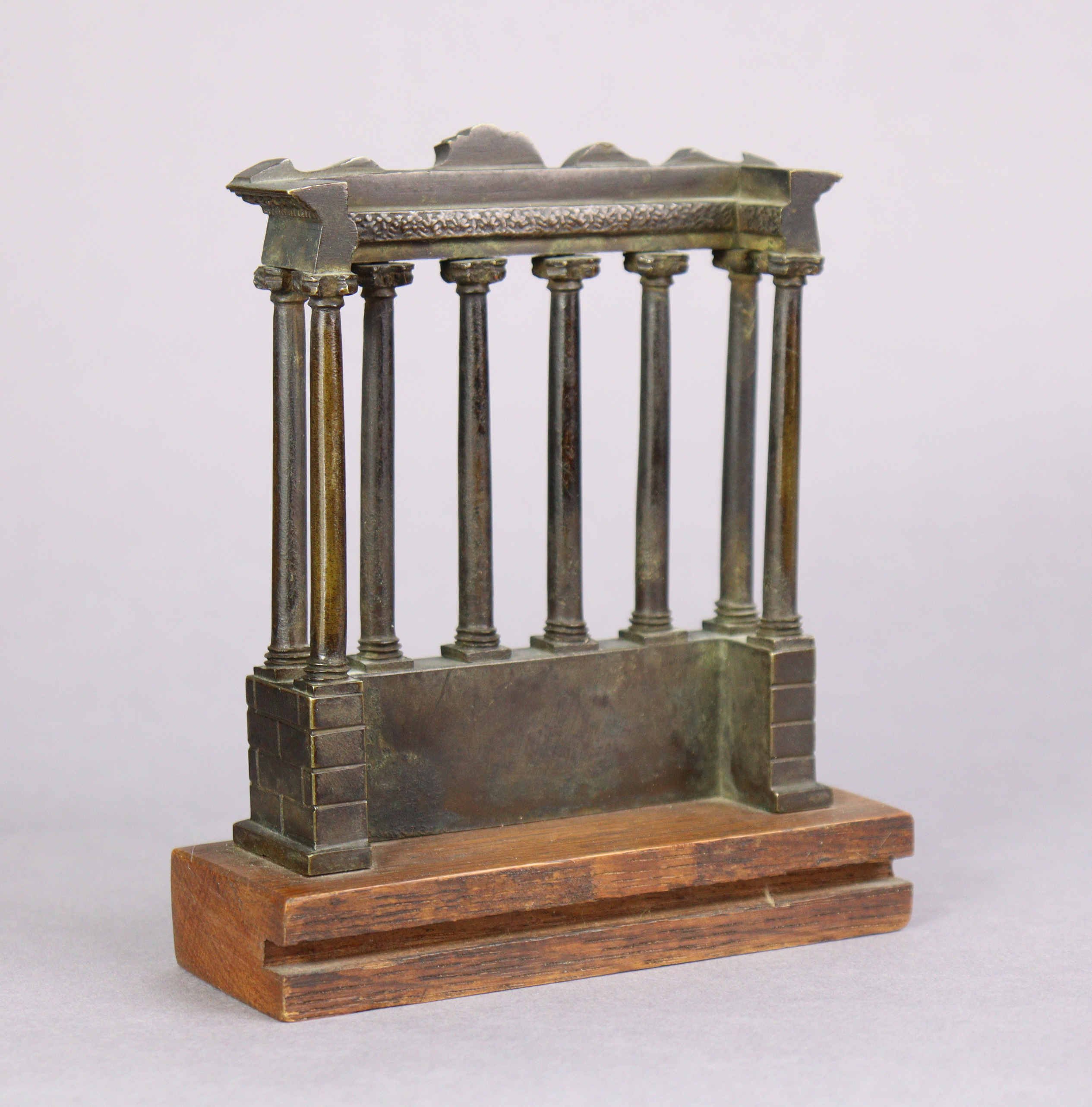 A 19th century Grand Tour bronze model of the Temple of Saturn, mounted on an oak plinth, 5¼” high x - Image 3 of 3