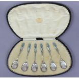 A set of six George V silver & enamel Egyptian revival coffee spoons with elongated oval bowls,