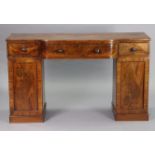 A 19th century mahogany small pedestal sideboard fitted three frieze drawers with turned handles,
