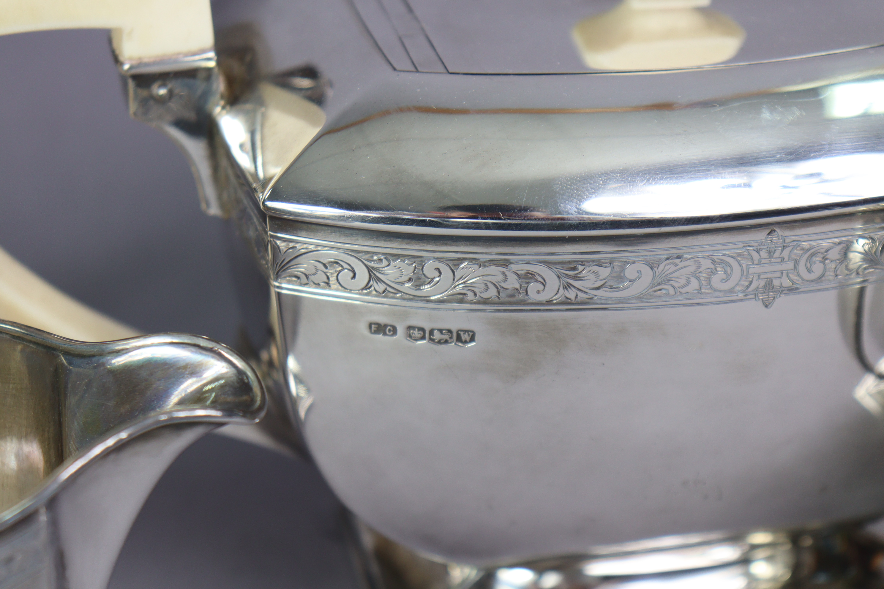 An Art Deco silver four-piece tea & coffee service of curved oblong form, each with narrow band of - Image 3 of 3