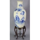 A Chinese porcelain large ovoid vase painted with warriors & dignitaries in a landscape, 16¼”