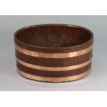 A George III-style oak & copper-bound oval wine cooler, 10” high x 20¼” wide x 16½” deep. (the