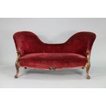 A Victorian mahogany frame large two-seater conversation seat, with buttoned back & sprung seat