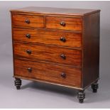 A Victorian mahogany chest with moulded edge to the plain rectangular top, fitted two short &