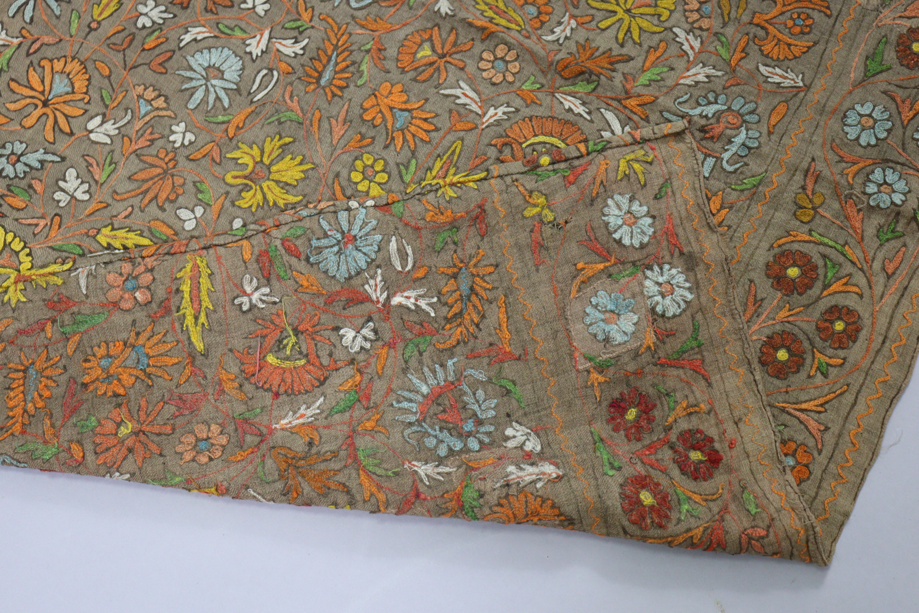 An early 20th century Indian crewelwork embroidered panel with multicoloured floral design, 5’5” x - Image 3 of 8