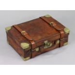 A late 19th/20th century tan leather & brass mounted cartridge case, embossed initials R. W. C. to