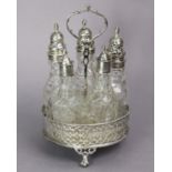 A George III silver cruet stand with tall central ring handle & circular base with pierced