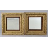A pair of 19th century giltwood & gesso rectangular picture frames forming wall mirrors, inset