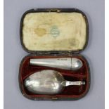 A Victorian silver patent travelling combination spoon & corkscrew, the spoon with hollow tapered